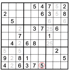 Sudoku puzzle partially filled with new number and ghost numbers that were found because of the T patterns
